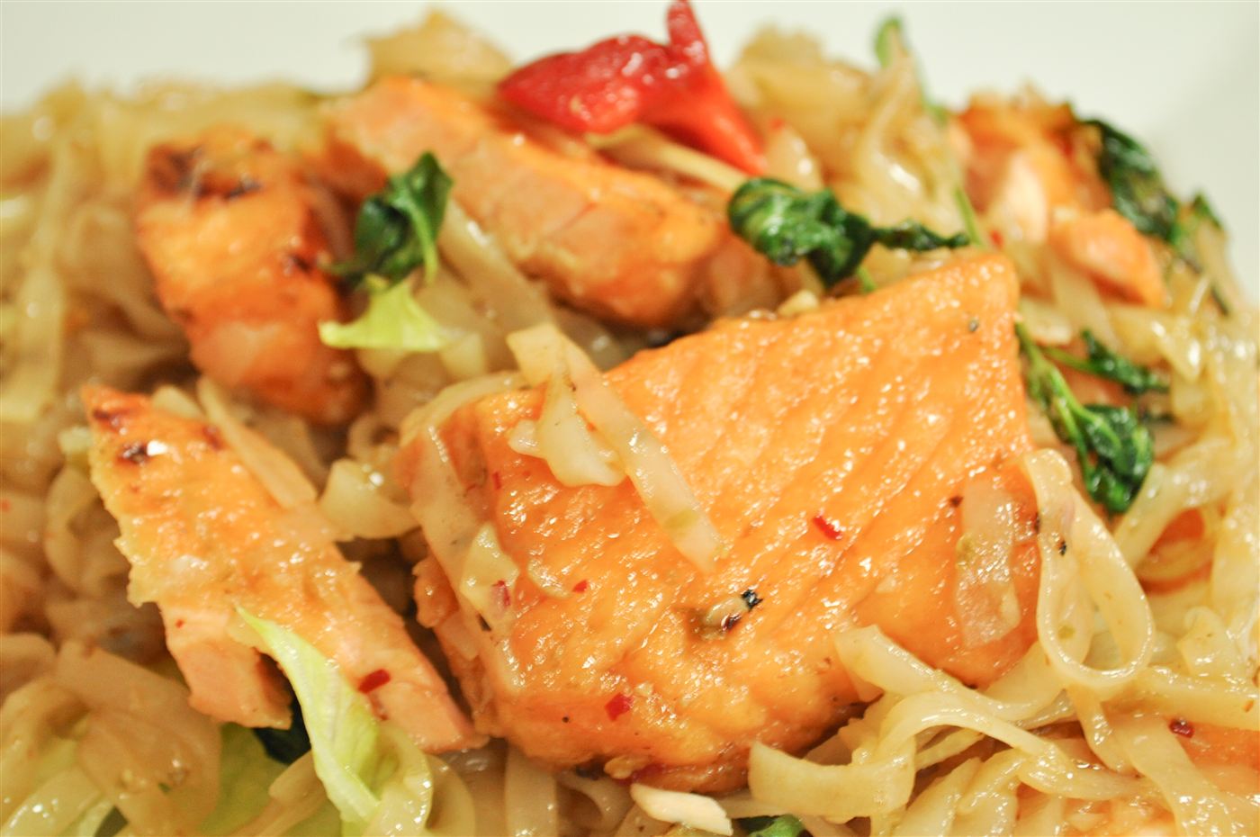 Monsoon Salmon — spicy rice noodles with salmon and Thai basil